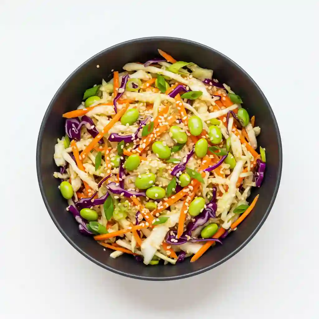 Asian sesame slaw with cabbage, carrots, and sesame seeds.