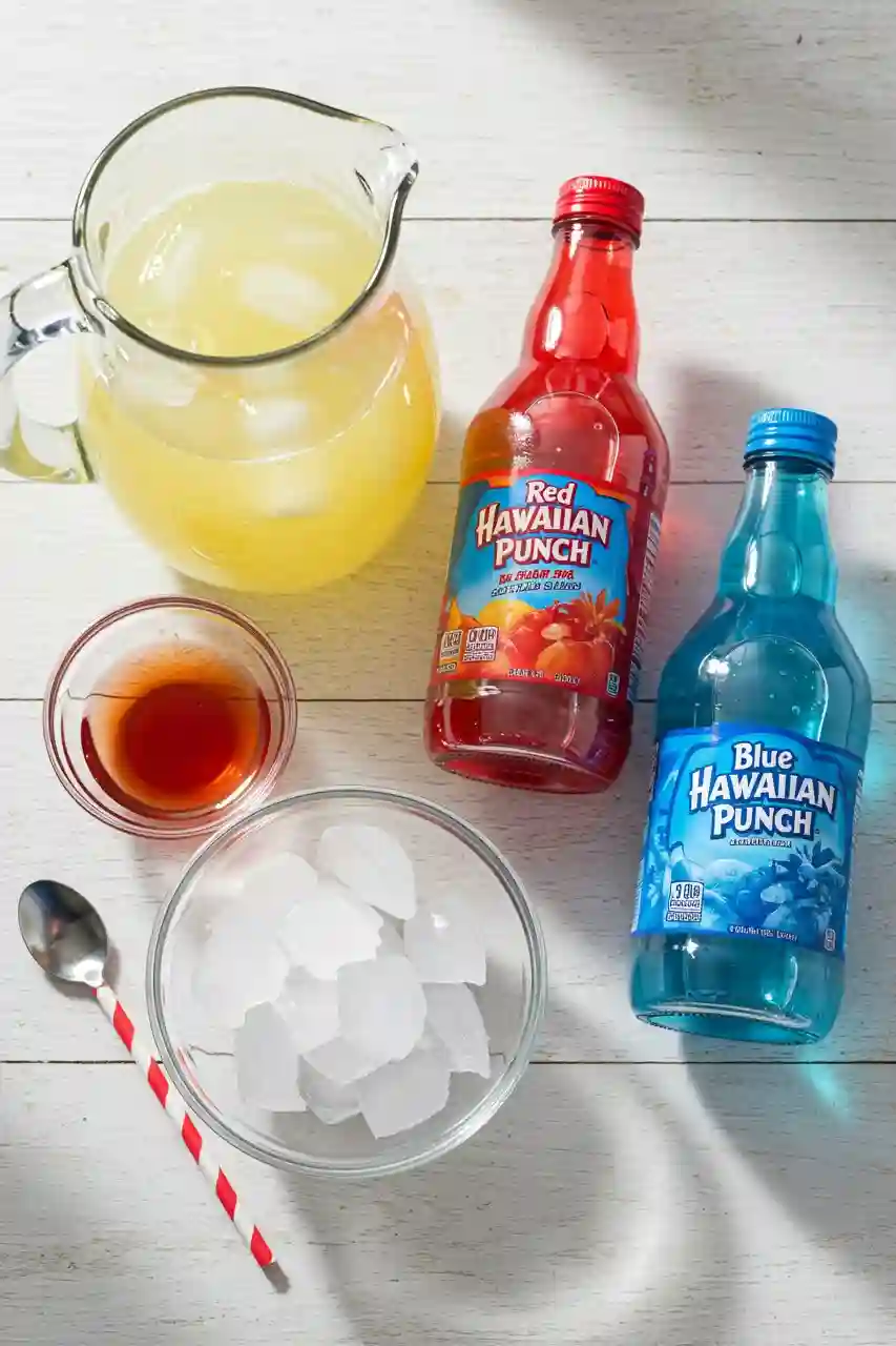 patriotic-slushy-mocktail-ingredients.webp Ingredients for patriotic slushy mocktail with juices and ice